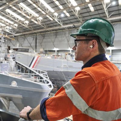 Man looking over ship